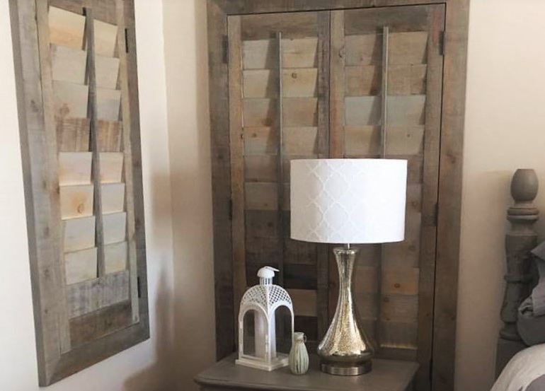 Raleigh bedroom with recycled wood shutters.